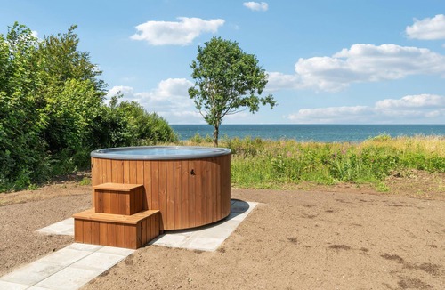 Allingabro House | Enjoy a relaxing vacation in this vacation home with sea panorama.