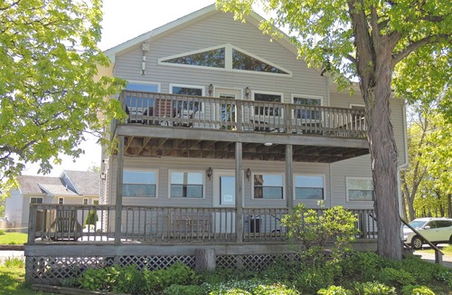 Cape Vincent Apartment | Enjoy a spectacular view of the St. Lawrence River from the Owner’s Apartment.
