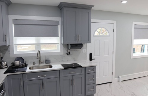 Woodbury House | Enjoy a stylish experience at this Central Valley, modern 3 bedroom home.
