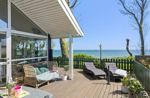 Skarup Fyn House | Enjoy a wonderful vacation in this cozy vacation home right by the sea.