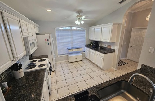 Beachwalk Isles House | Enjoy amazing sunsets over the lake with private, heated pool. Quiet subdivision