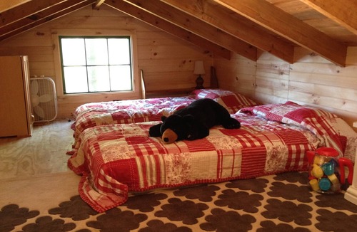 Silver Bay Cottage | Enjoy an incredible view while perched above the water