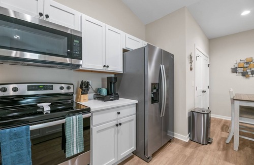 Goddard House | Enjoy beautiful sunsets, all while being close to shopping, dining, and fun!