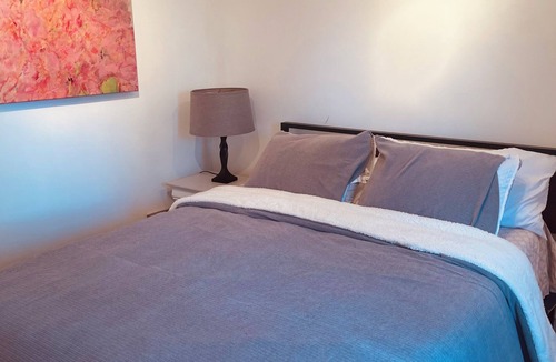 Souderton Apartment | Enjoy comfort, convenience, and a peaceful setting in this beautifully bedroom