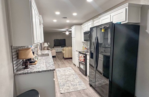 Gainesville House | Enjoy farmhouse charm in this 4-bedroom, 2-bath ranch retreat minutes from downtown Gainesville, the Frank Buck Zoo, and local parks. Sleeps up to 10 with a bright open layout, cozy country feel, and plenty of space for families or group getaways.