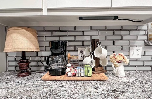 Gainesville House | Enjoy farmhouse charm in this 4-bedroom, 2-bath ranch retreat minutes from downtown Gainesville, the Frank Buck Zoo, and local parks. Sleeps up to 10 with a bright open layout, cozy country feel, and plenty of space for families or group getaways.