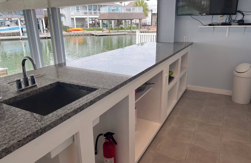 Jamaica Beach House | ENJOY FISHING, SWIMMING OR JUST RELAXING AT THIS JAMAICA BEACH CANAL PROPERTY