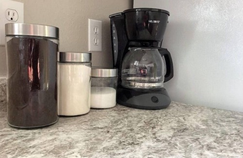 Altoona House | Enjoy golf course views with hot tub and fire pit.