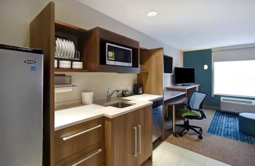 Wichita Hotel | Enjoy Homey Comfort w/In-Room Kitchen at Wichita Downtown Location