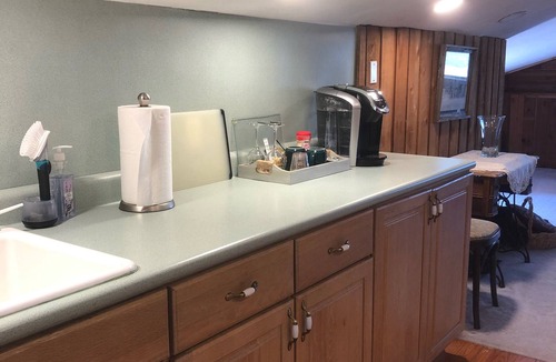 Edmond Cabin | Enjoy our loft with a private hot tub overlooking the vineyard and pond.