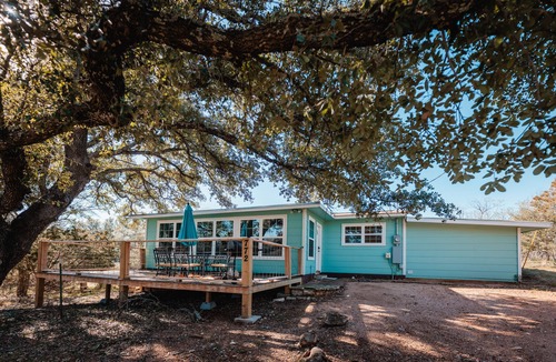 Sunrise Beach Village Cottage | Enjoy our speakeasy at our 2 bedroom cottage!