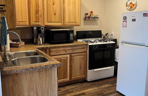 Beaver County Apartment | Enjoy peaceful prairie sunsets in rustic lodging in No Mans Land.