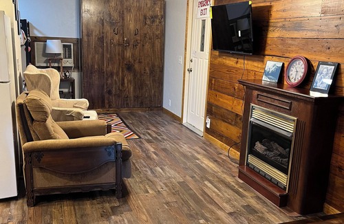Beaver County Apartment | Enjoy peaceful prairie sunsets in rustic lodging in No Mans Land.