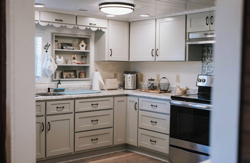 Pisgah House | Enjoy private farm, golf cart, fishing, walking trails @ Storybook Farmhouse
