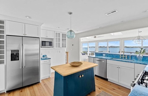 Scituate House | Enjoy serene oceanfront home with harbor views.