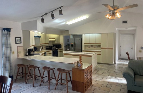 Spruce Creek House | Enjoy the Daytona 500 or Bike Week w/friends at this Port Orange 5 bed home.
