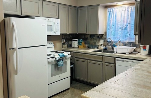 Walden on Lake Conroe Condo | Enjoy the Ducks and Fishing in this Waterfront!