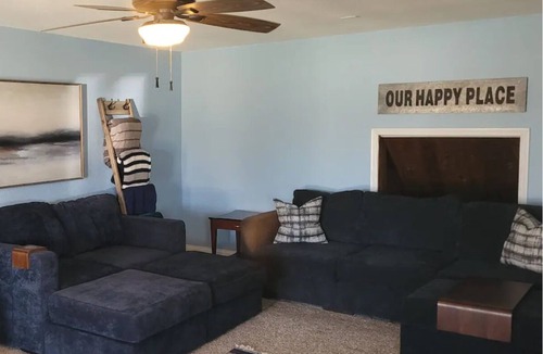 Dennis Cottage | Enjoy the river with a pool, firepit and a balcony with a gorgeous water view.