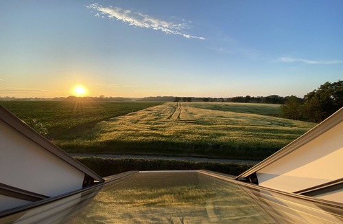 Gudhjem House | Enjoy the sunset above the fields.