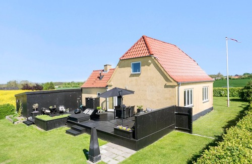 Korsor House | Enjoy the tranquillity of nature in this vacation home, nestled in an idyllic landscape.