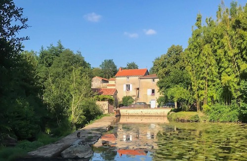 La Coudre House | Enjoy tranquility, charming living and lush nature in this beautiful mill complex.