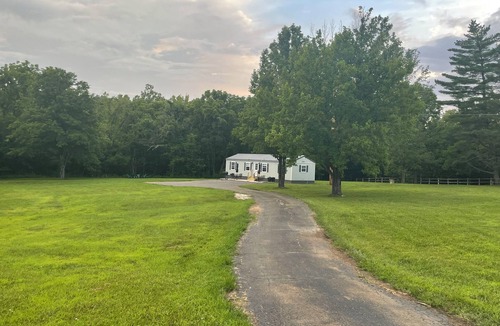 Black House | Enjoyable 2-bedroom house on 24 acres right on Black River.