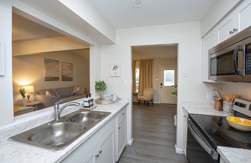 Virginia Beach House | Enticing Den with Backyard and Indoor Fireplace