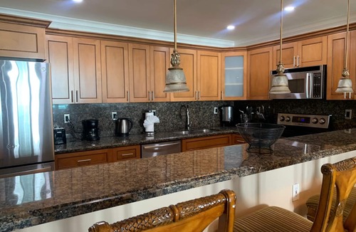 Golden Beach Condo | Entire condominium with a pool view, steps from the beach