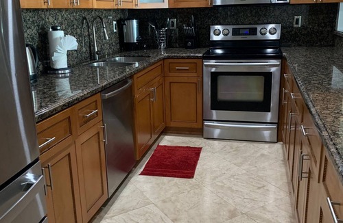 Golden Beach Condo | Entire condominium with a pool view, steps from the beach