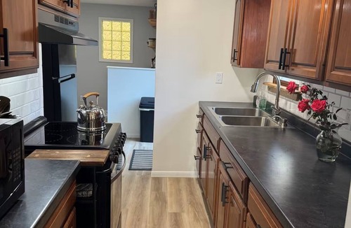 Portage Lakes House | Entire Home w/Lake View & Hot Tub, Kid & Dog Fence Yard, Book Nook, VHS TV