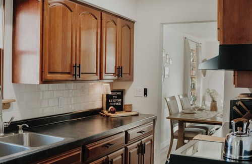 Portage Lakes House | Entire Home w/Lake View & Hot Tub, Kid & Dog Fence Yard, Book Nook, VHS TV