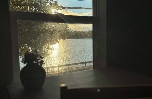 Portage Lakes House | Entire Home w/Lake View & Hot Tub, Kid & Dog Fence Yard, Book Nook, VHS TV