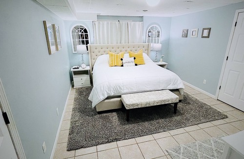Freeport House | Entire lower level in a private home with walkout fenced yard.