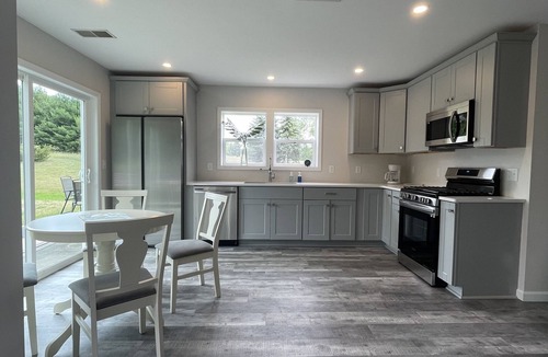 Rapid City House | Equestrian Charm near Torch Lake: Two homes in one!