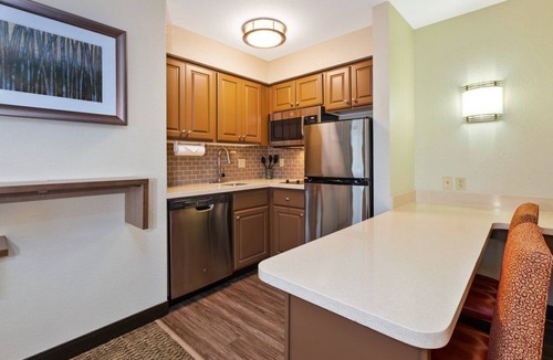 Kalamazoo Condo | Equipped Suite | Business Center + Indoor Pool