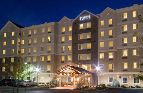 Amherst Condo | Equipped Suite | Free Daily Breakfast, Pool Access + Gym Access