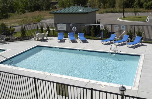 Briargate Condo | Equipped Suite with FREE Breakfast, Outdoor Pool + Gym Access