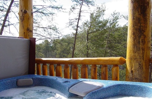 Pigeon Forge Cabin | Ern854 - Wagon Wheel Lodge - Great Location! Close To All The Action! 9 Bedroom Cabin by RedAwning