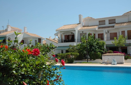 Torre de la Horadada House | Cozy Bungalow with terrace overlooking swimming pool.