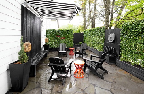 Downtown Apartment | Escape the ordinary and indulge in your own private, cozy oasis at this modern studio walk-up with private secret garden, bike storage and bike wash station.