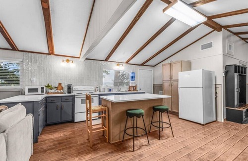 Bowie Cabin | Escape to a Cozy Lakefront Cabin on Lake Amon Carter with Private Dock