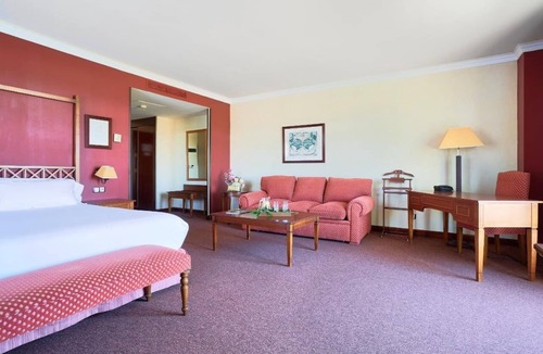 Cebreros Hotel | Escape to a Spacious Room Surrounded by Beautiful Gardens