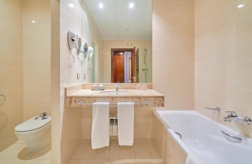 Cebreros Hotel | Escape to a Spacious Room Surrounded by Beautiful Gardens