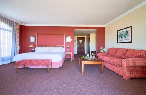 Cebreros Hotel | Escape to a Spacious Room Surrounded by Beautiful Gardens