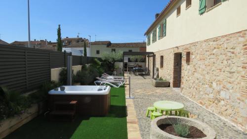 Avinyonet de Puigventos House | Escape to a spacious retreat with garden
