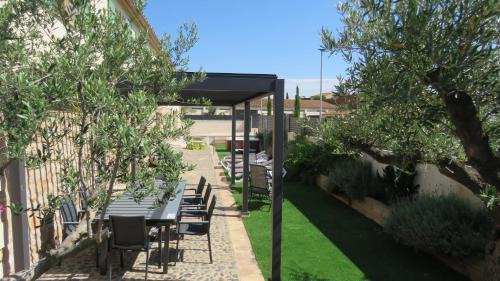 Avinyonet de Puigventos House | Escape to a spacious retreat with garden