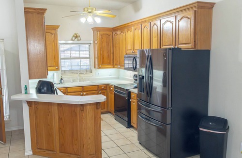 Gainesville House | Escape to Floral Cottage, a charming 3-bed, 2-bath retreat in Gainesville for up to 10 guests. This peaceful home in a quiet residential area features a private pool & spacious yard. Perfect for families or groups seeking a relaxing getaway.