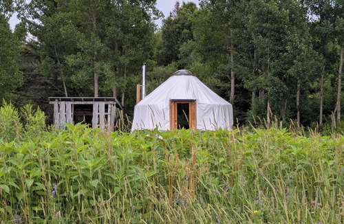 Powassan RV Rental | Escape to Nature: Cozy Yurt on a Heritage Farm with Trails, Pond, & Sauna