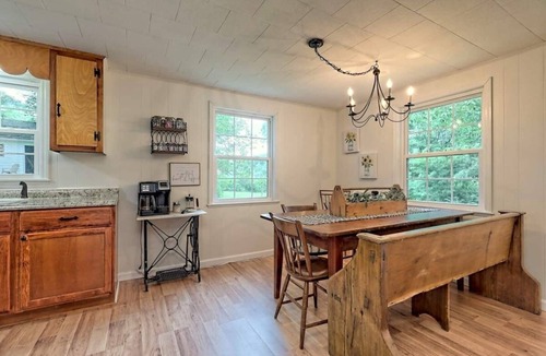 Scaly Mountain House | Escape to nature with this pet-friendly, family retreat just 15 minutes from Highlands! Perfect for hiking, relaxing, and playtime with the kids. Utilize the outdoor fire pit, indoor fireplace and the playhouse in the side yard full of games!