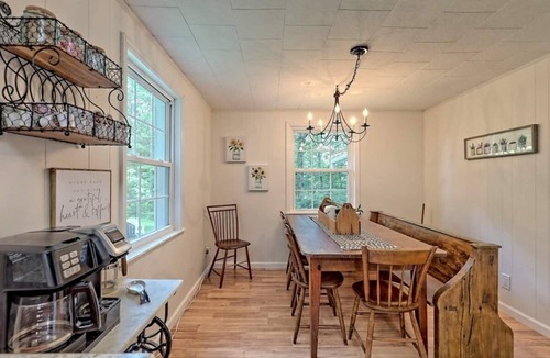 Scaly Mountain House | Escape to nature with this pet-friendly, family retreat just 15 minutes from Highlands! Perfect for hiking, relaxing, and playtime with the kids. Utilize the outdoor fire pit, indoor fireplace and the playhouse in the side yard full of games!